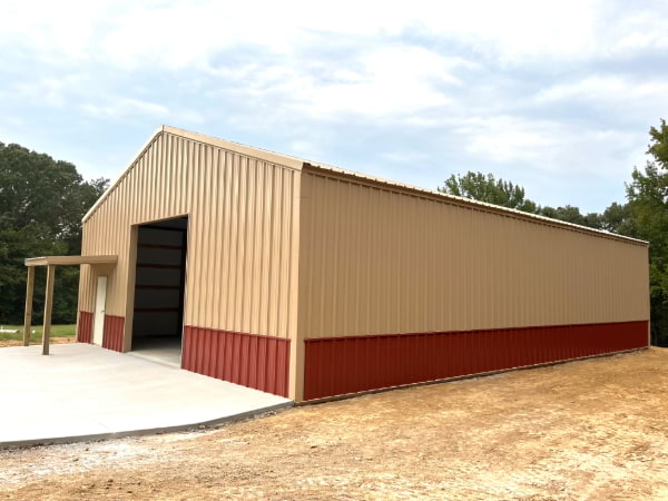 Blue Steel Manufacturing post frame building with wainscot