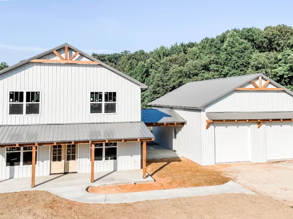 Blue Steel Manufacturing post frame shop home with garage