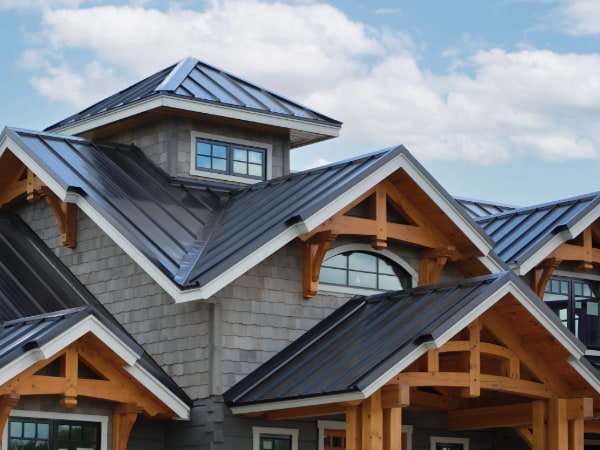 Mechanical seam roof and decorative wooden trusses