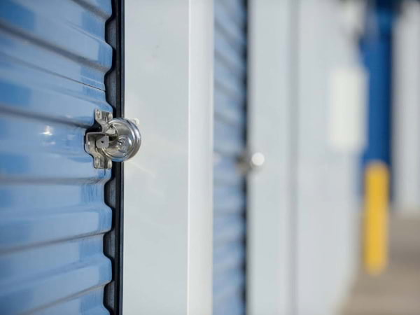 close up look of a blue and white storage unit that Blue Steel Manufacturing built.