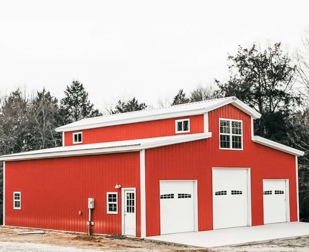 Blue Steel Manufacturing red post frame barn