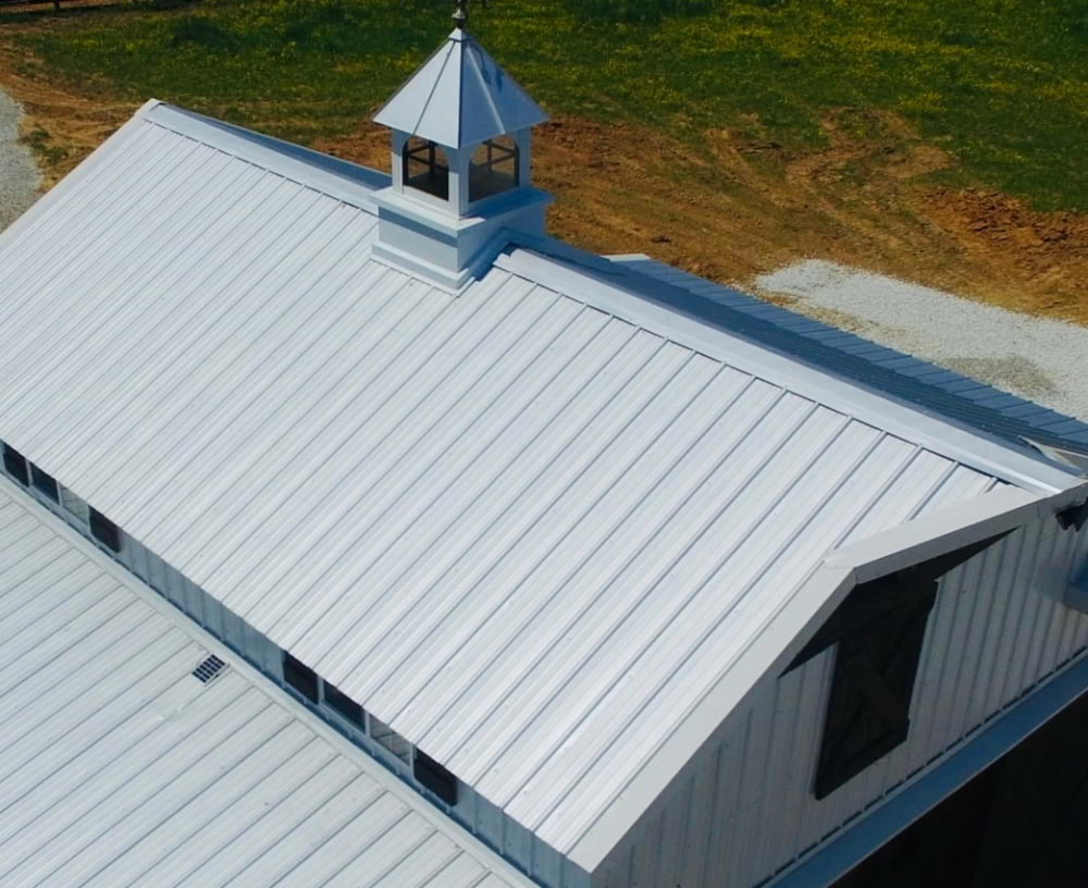 Blue Steel Manufacturing galvanized roof with cupola